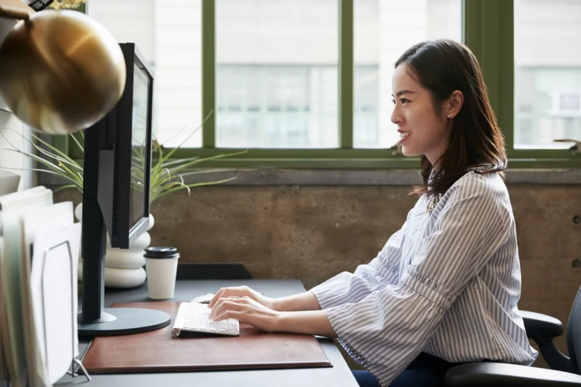 woman working at computer in an office