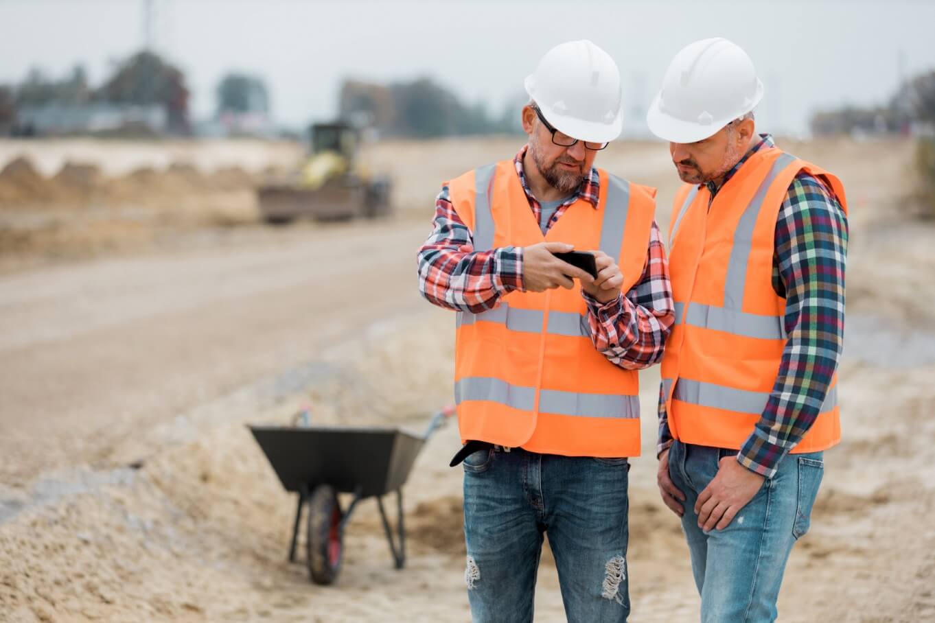 Two builders working on site.