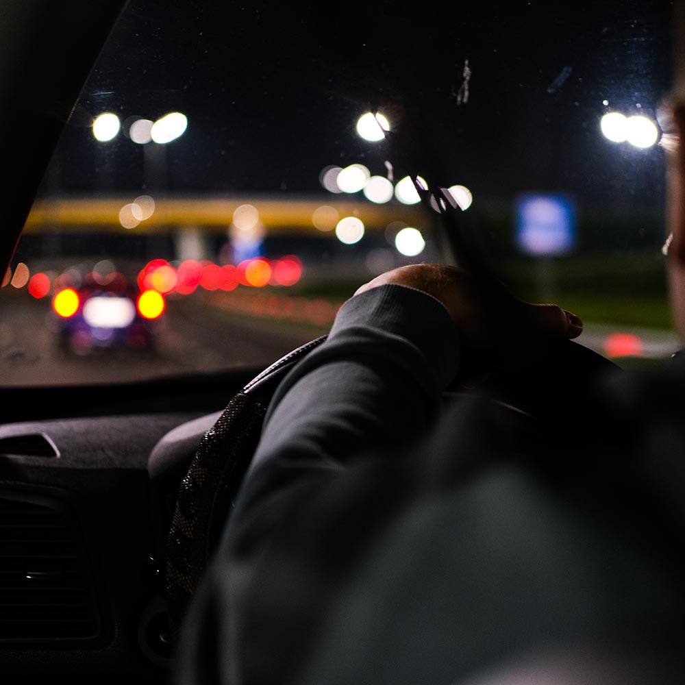 A man driving a car.