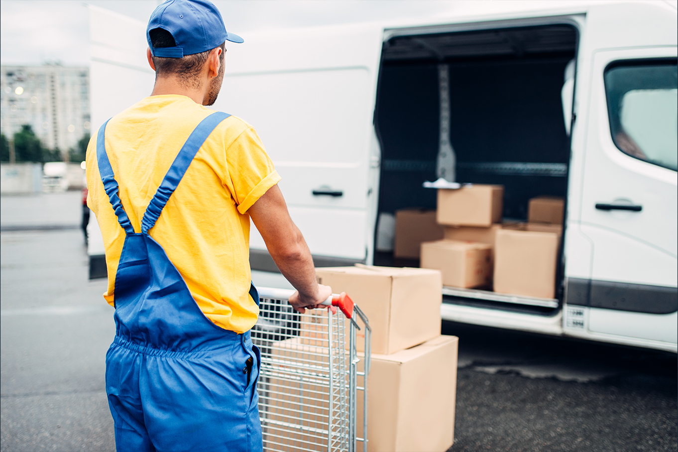 A man loading a van.